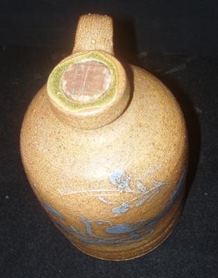 Top of jug with cork