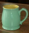 green and yellow mug